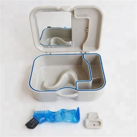 Estuche de viaje de plástico para limpieza de dentaduras postizas con espejo